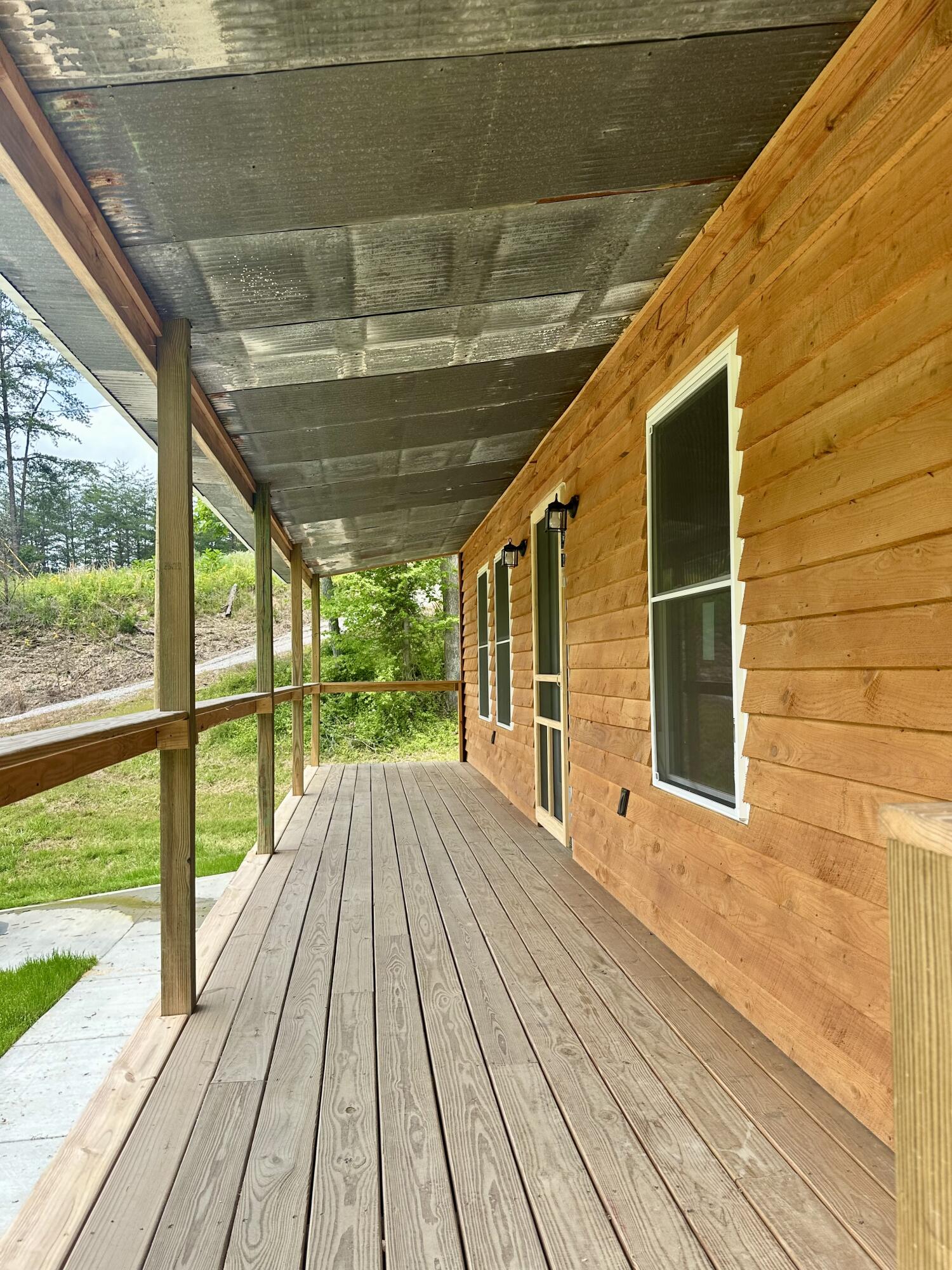 409 Freeman Branch Road East Bernstadt, KY 40729 - Photo 6 of 43 HUGE PORCH