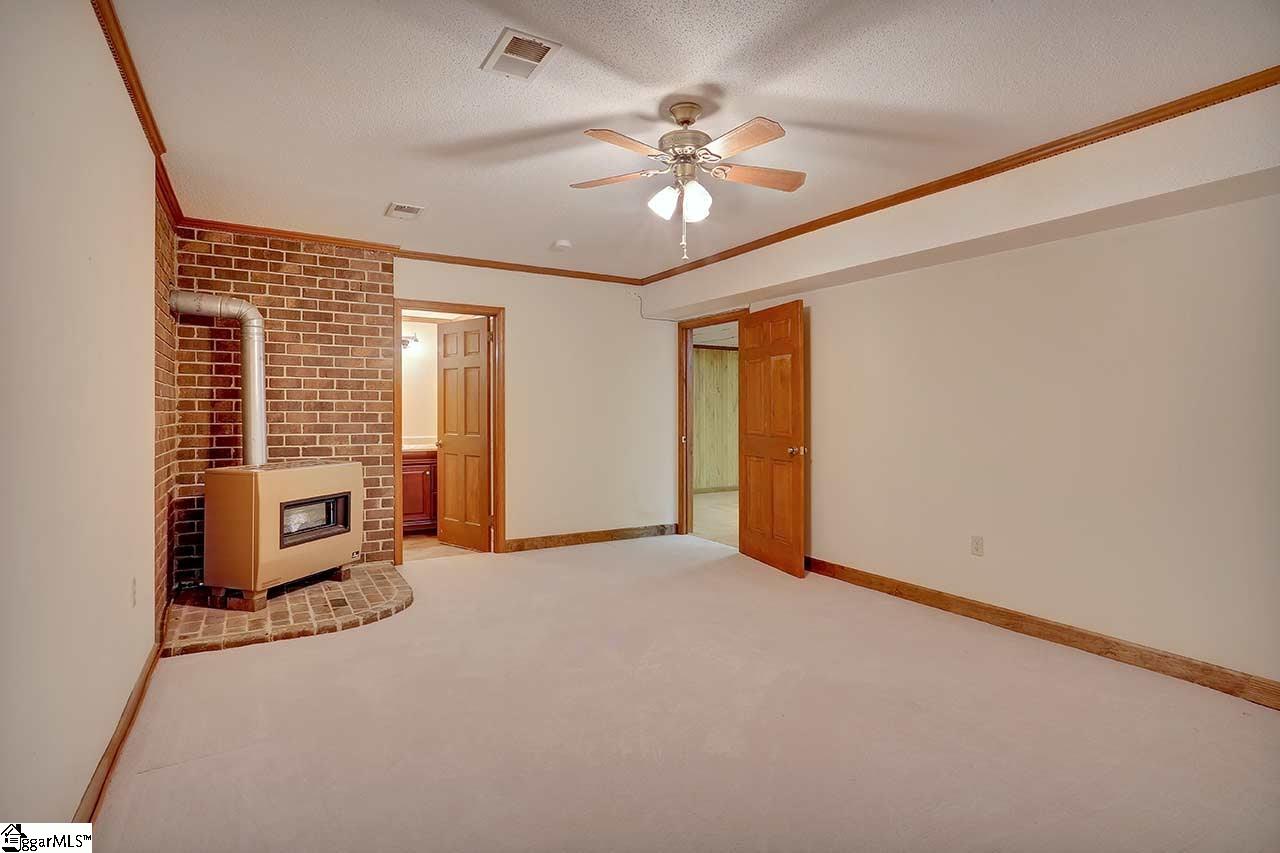 621 Settlement Road Travelers Rest, SC 29690 - Photo 24 of 36 Fireplace is only for supplemental heat. This area is heated and cooled.