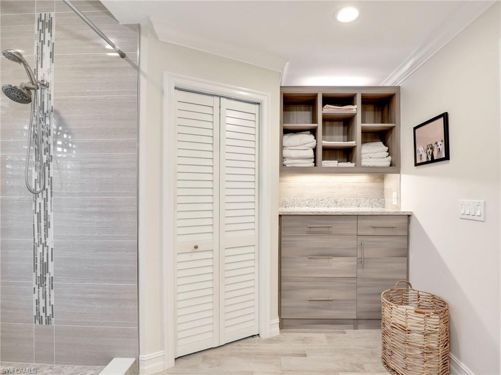 471 Ibis Way Naples, FL 34110 - Photo 12 of 40 a view of walk in closet