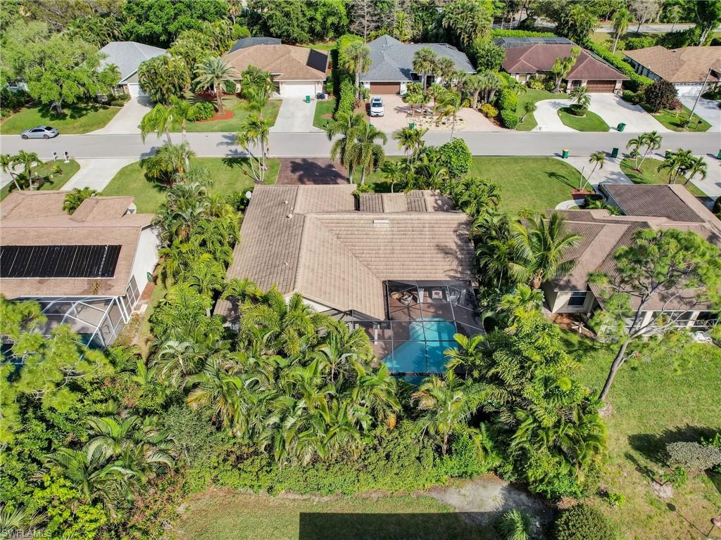 471 Ibis Way Naples, FL 34110 - Photo 39 of 40 an aerial view of a house with a yard