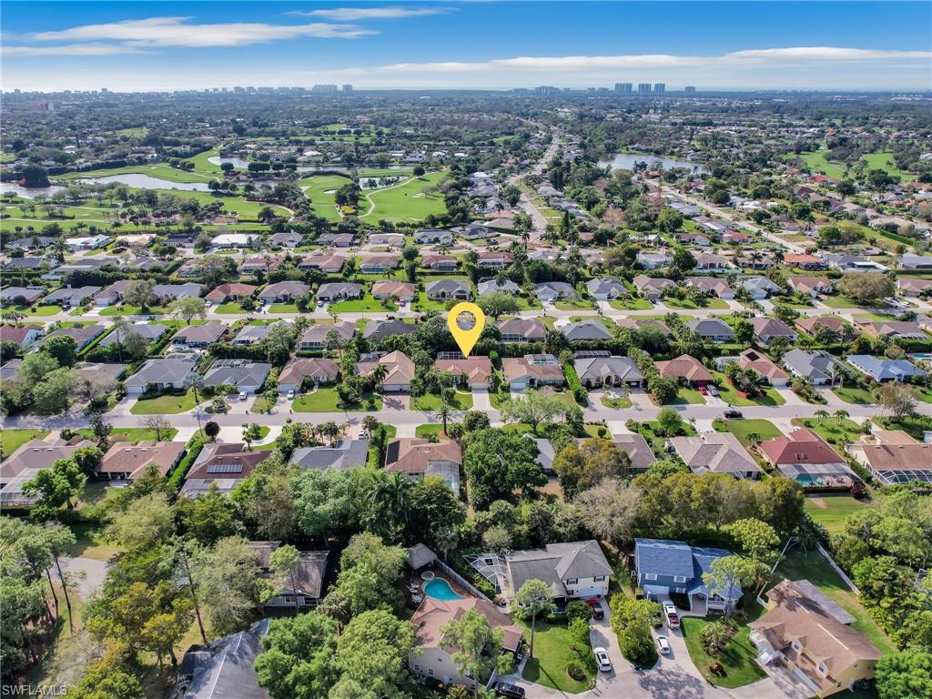 471 Ibis Way Naples, FL 34110 - Photo 40 of 40 an aerial view of multiple house