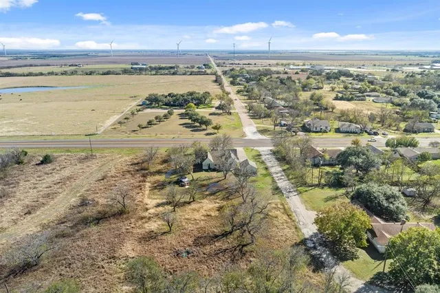 a view of a yard in front of a house