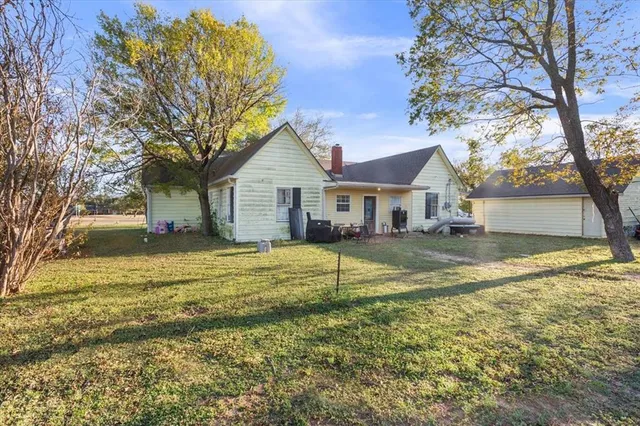 a house with trees in front of it