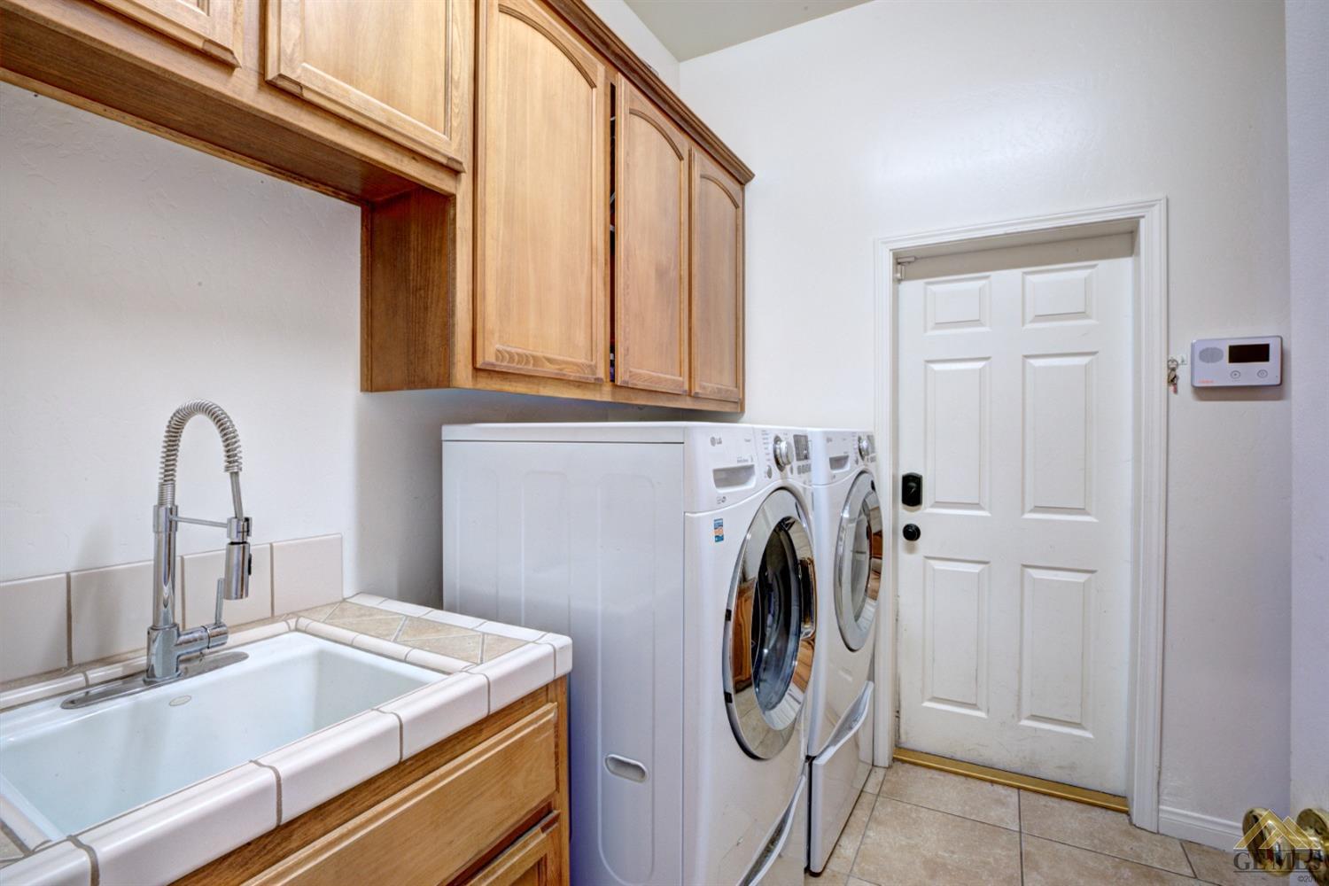 Undisclosed Address Shafter, CA 93263 - Photo 17 of 21 a utility room with dryer and washer