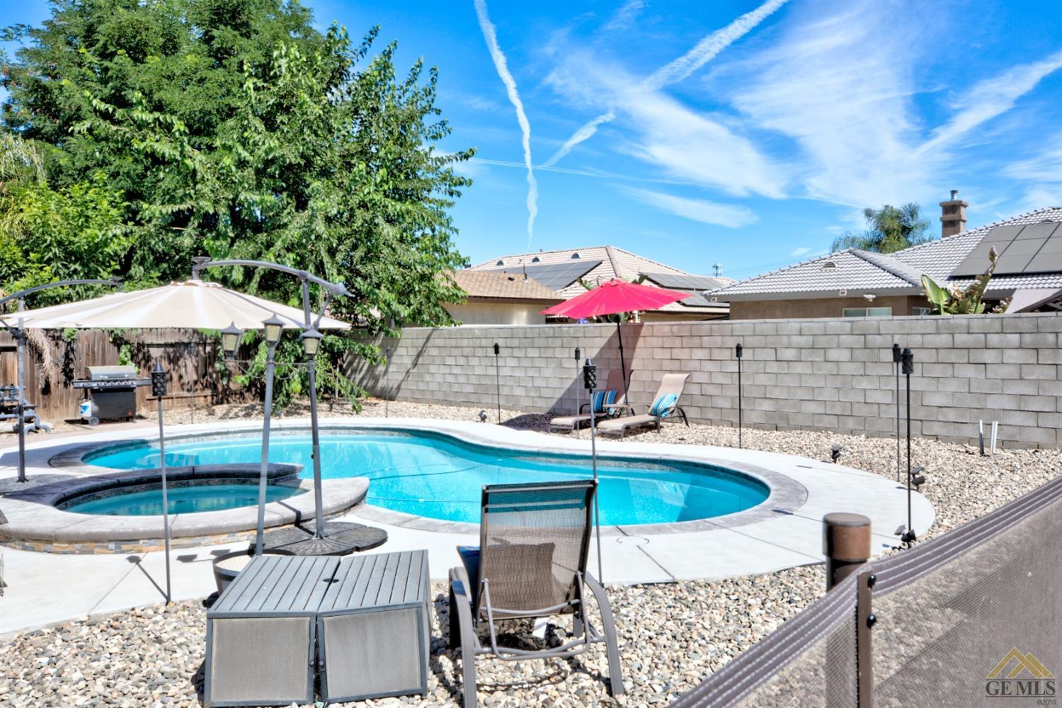 Undisclosed Address Shafter, CA 93263 - Photo 19 of 21 a view of a patio with swimming pool