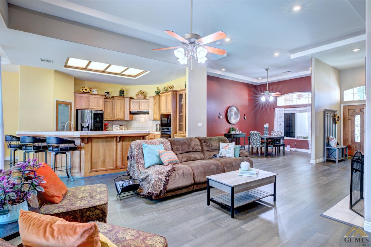 Undisclosed Address Shafter, CA 93263 - Photo 5 of 21 a living room with furniture kitchen view and a chandelier