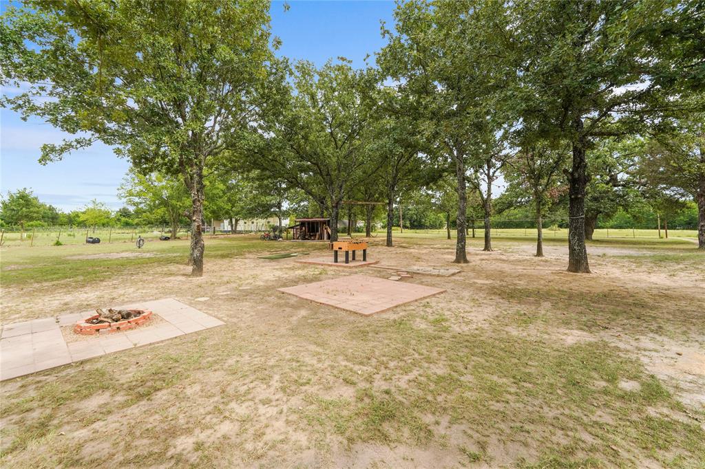 19331 Allen Ranch Road Eustace, TX 75124 - Photo 27 of 37 Front acreage with paved patio areas