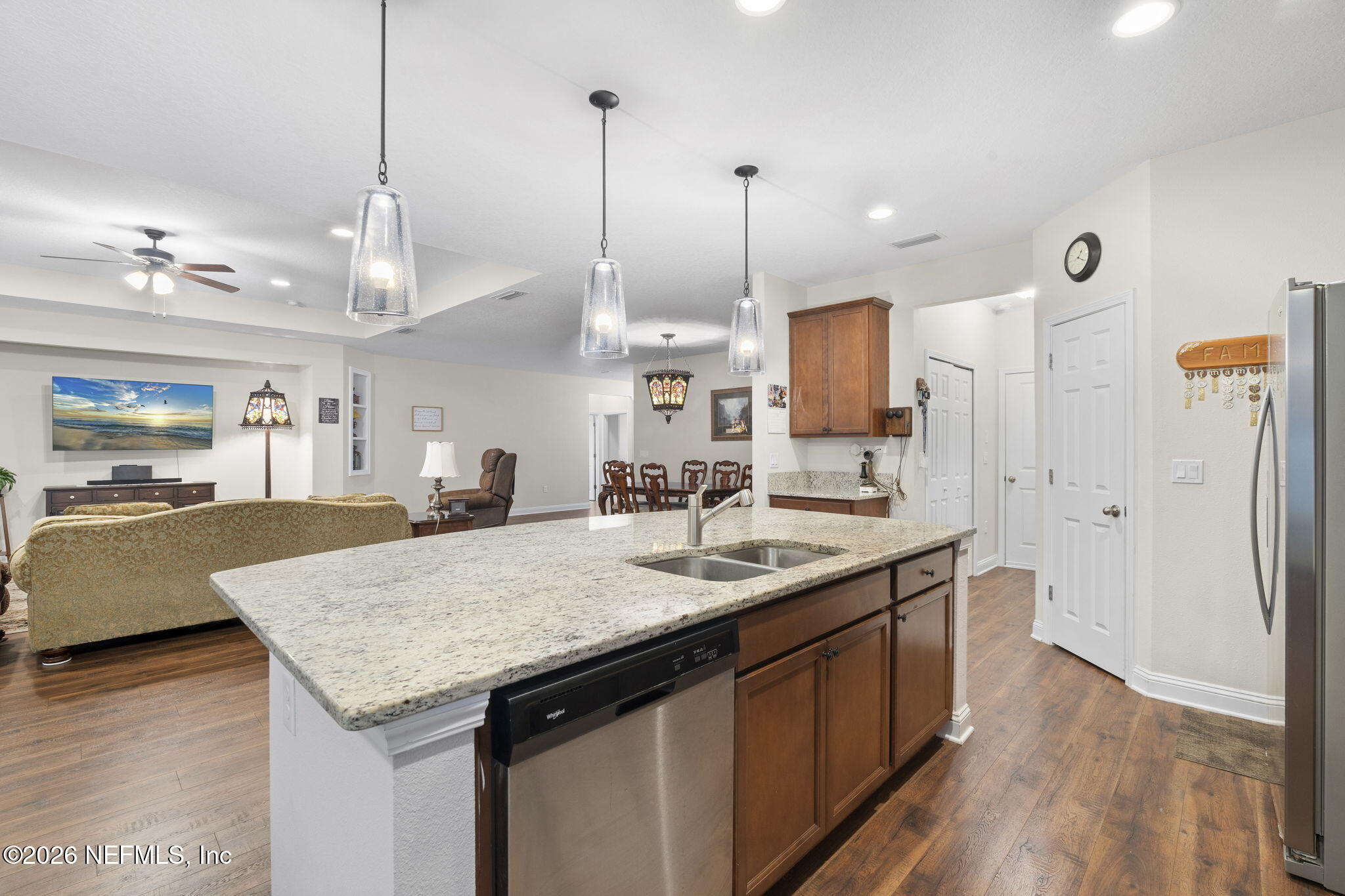 620 Ivory Palm Road Orange Park, FL 32073 - Photo 12 of 53 a kitchen with stainless steel appliances granite countertop sink stove and wooden floor