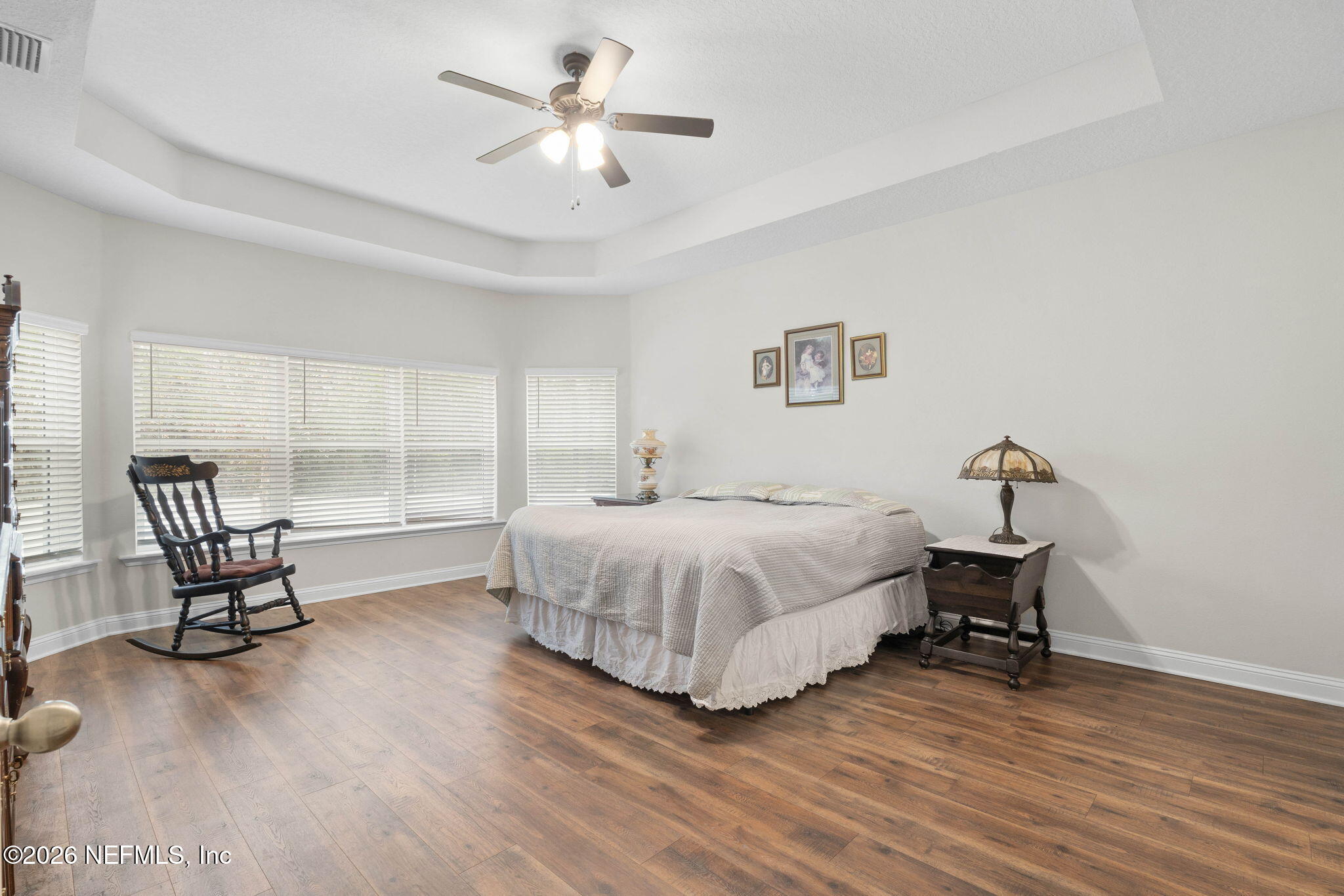 620 Ivory Palm Road Orange Park, FL 32073 - Photo 23 of 53 a bedroom with a bed a chair and piano