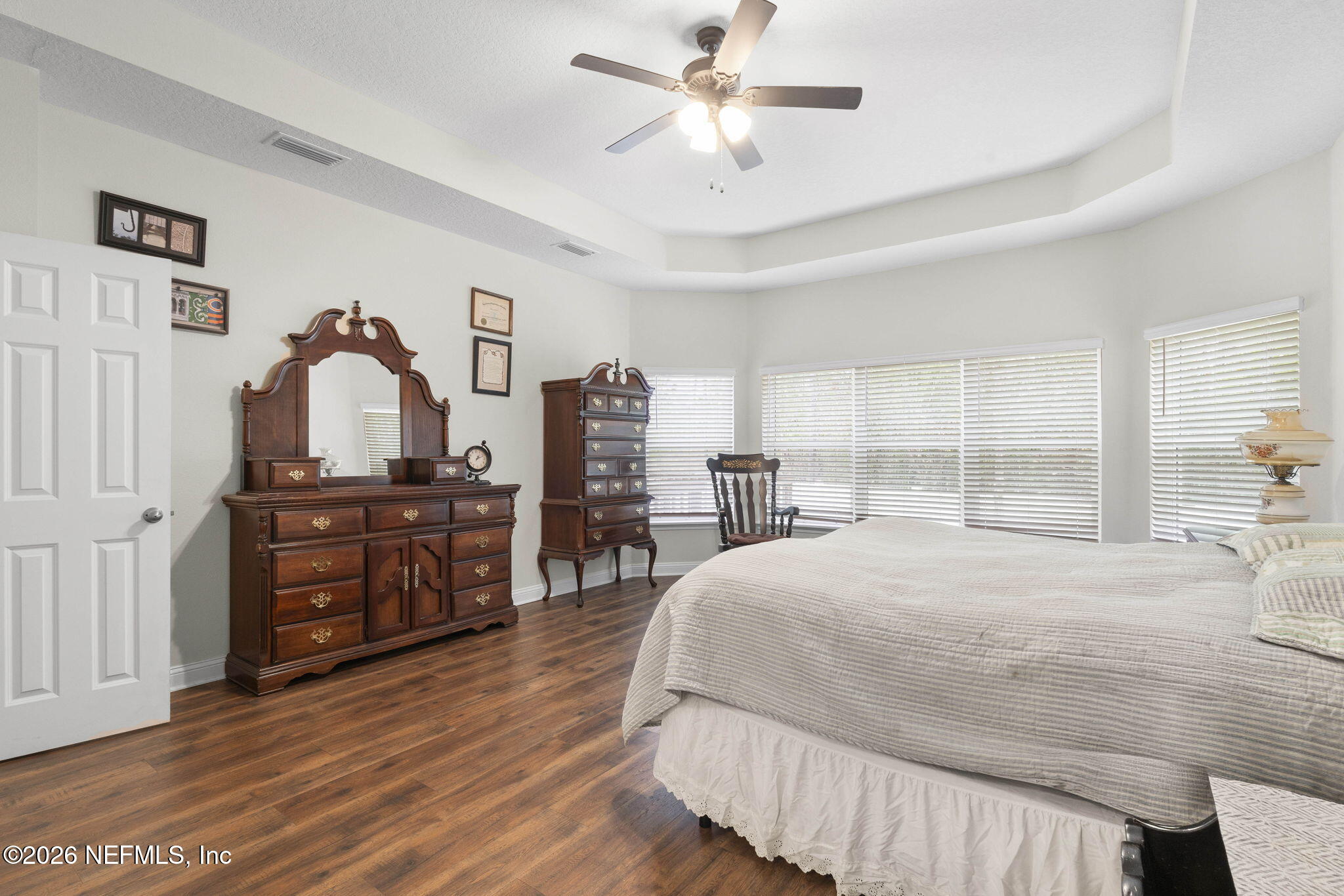 620 Ivory Palm Road Orange Park, FL 32073 - Photo 24 of 53 a bedroom with a bed and wooden floor