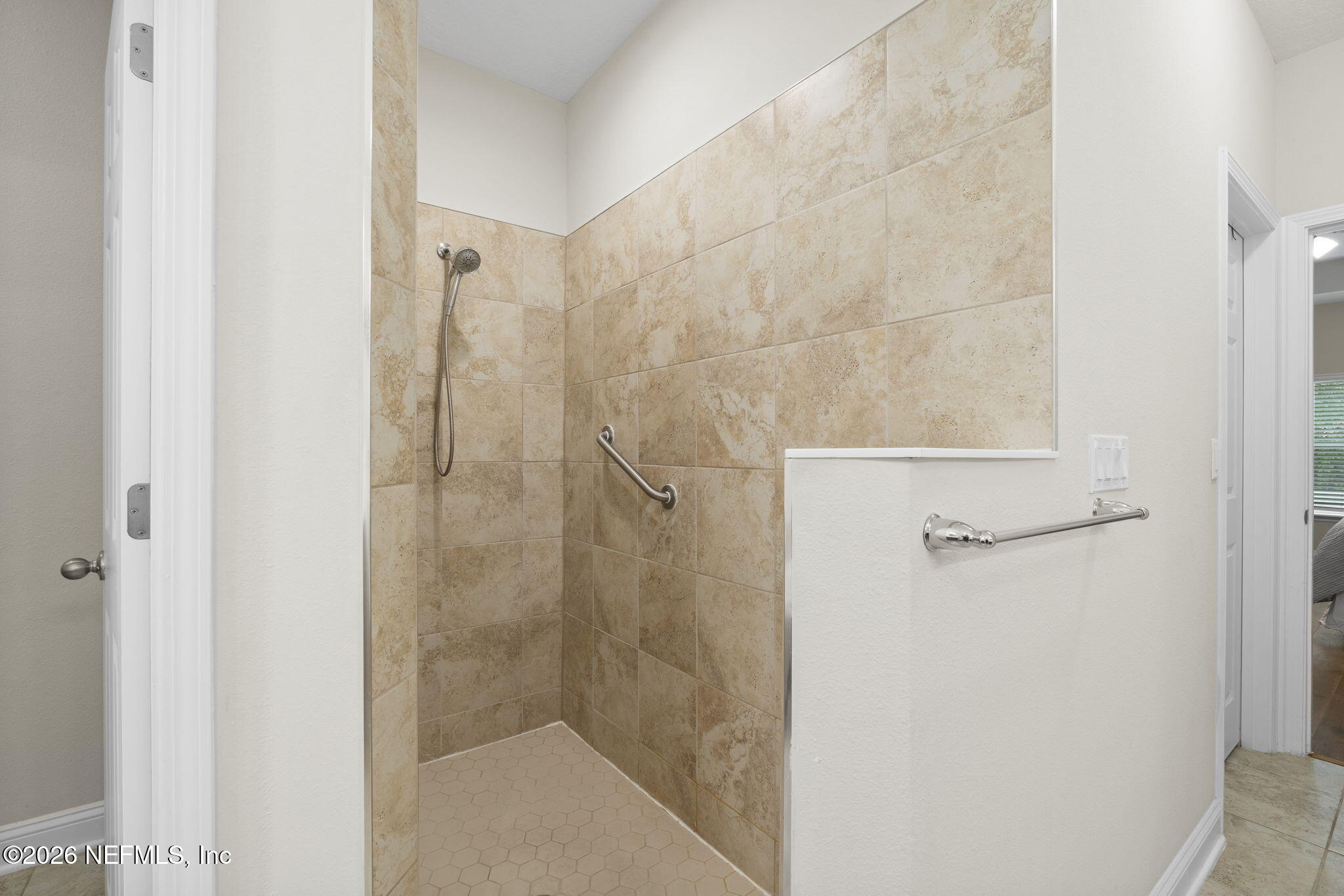 620 Ivory Palm Road Orange Park, FL 32073 - Photo 29 of 53 a bathroom with a glass shower door