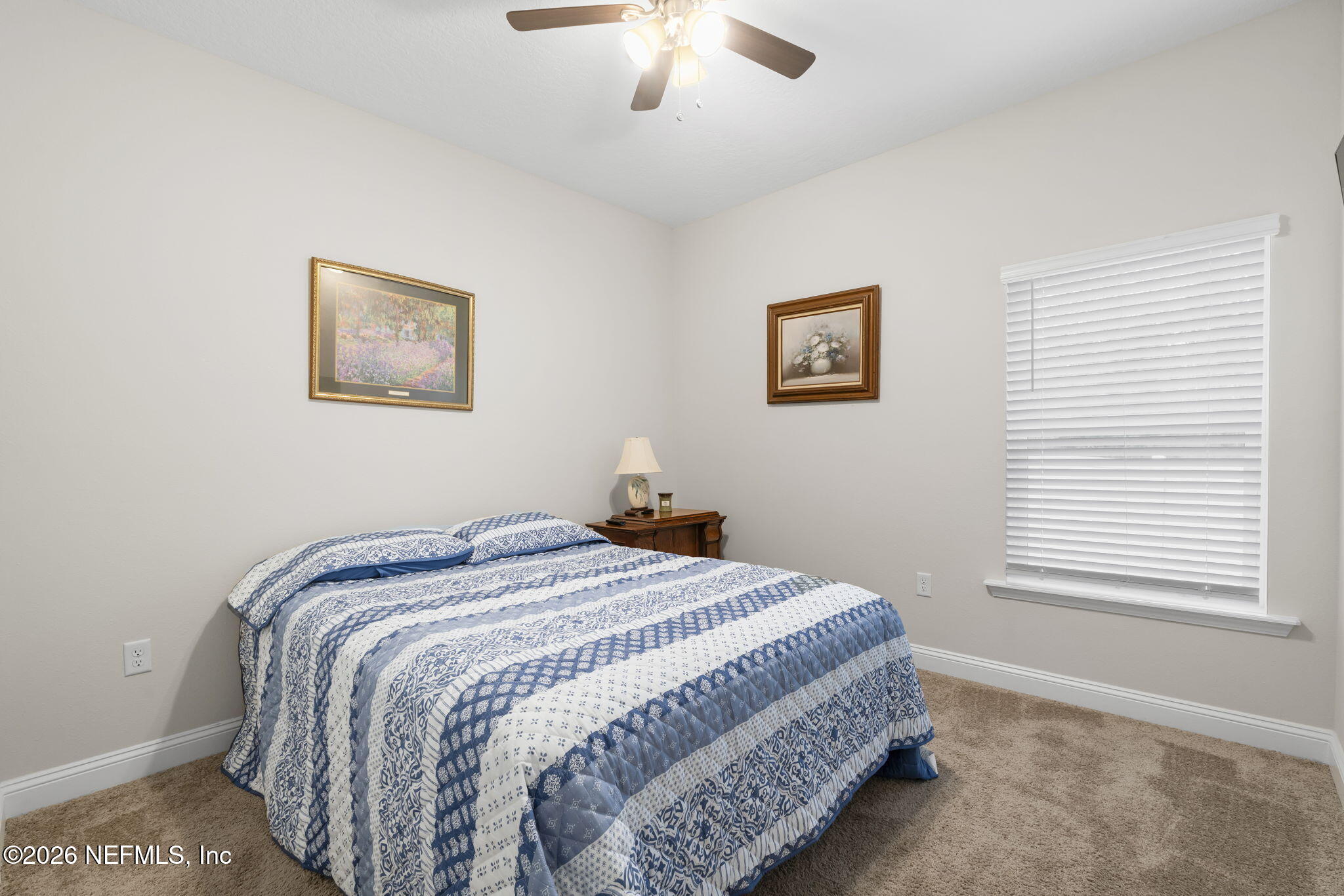 620 Ivory Palm Road Orange Park, FL 32073 - Photo 30 of 53 a bedroom with bed and a window