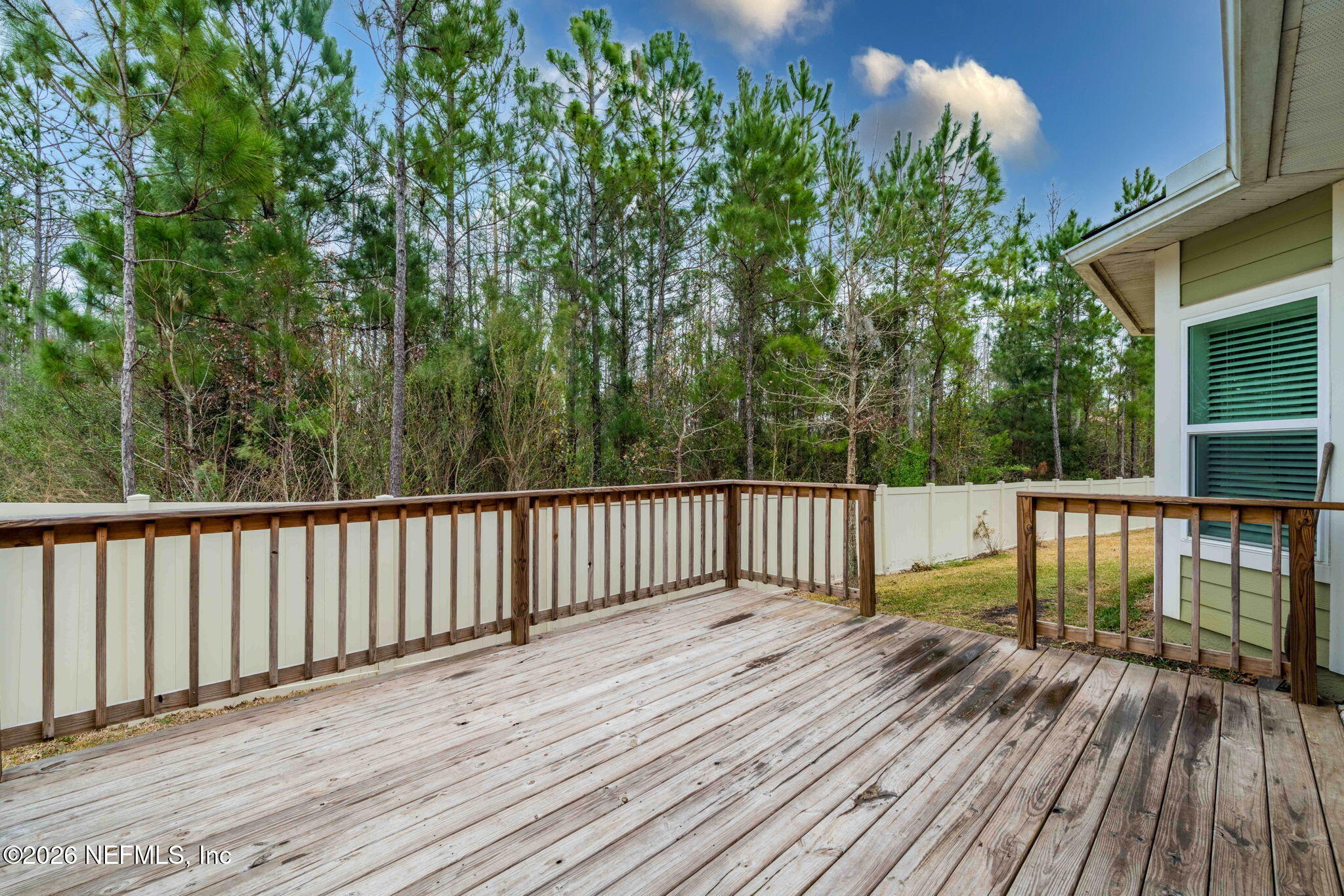 620 Ivory Palm Road Orange Park, FL 32073 - Photo 35 of 53 a view of balcony with wooden floor and fence
