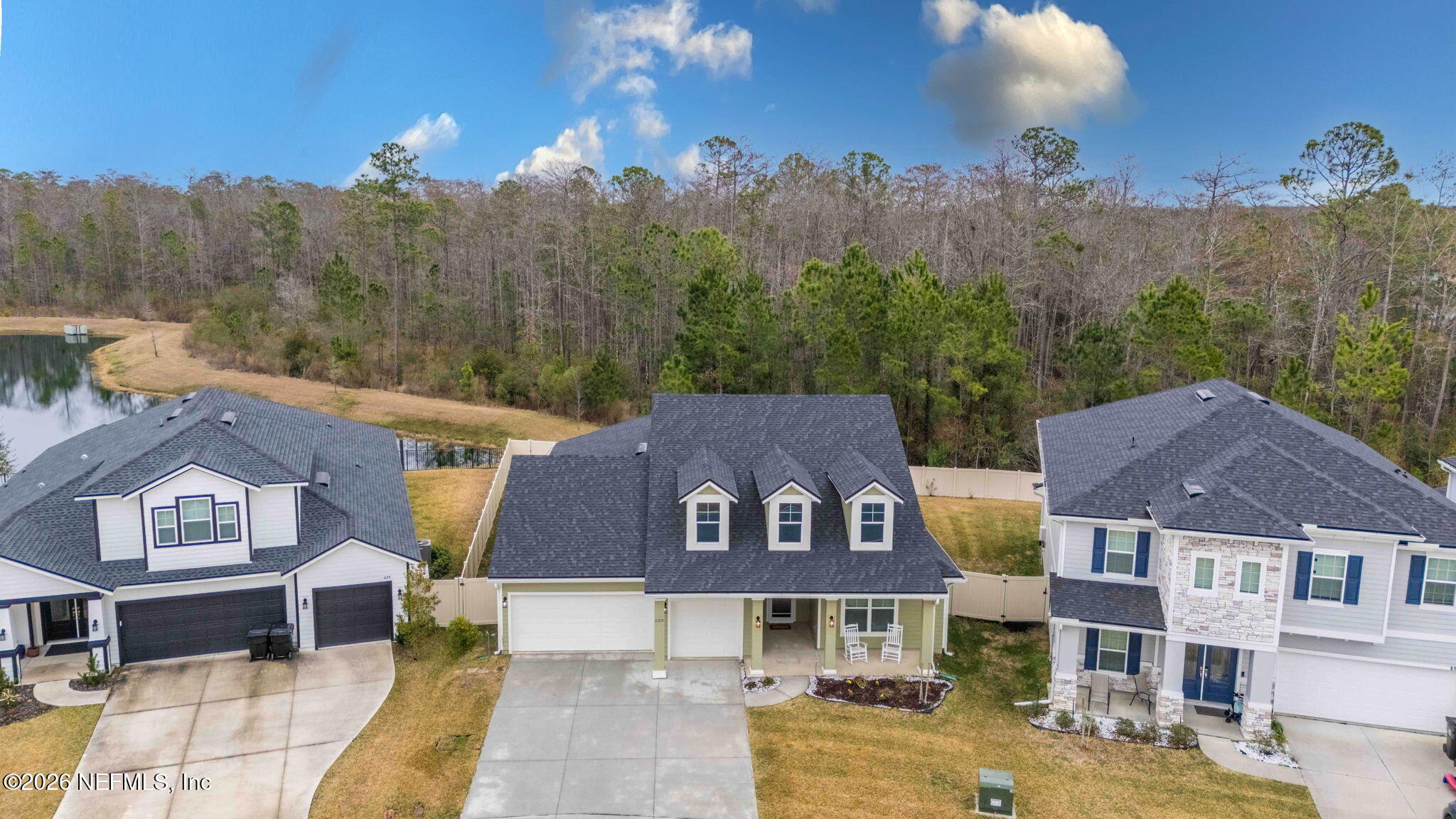 620 Ivory Palm Road Orange Park, FL 32073 - Photo 39 of 53 a front view of a houses with a yard