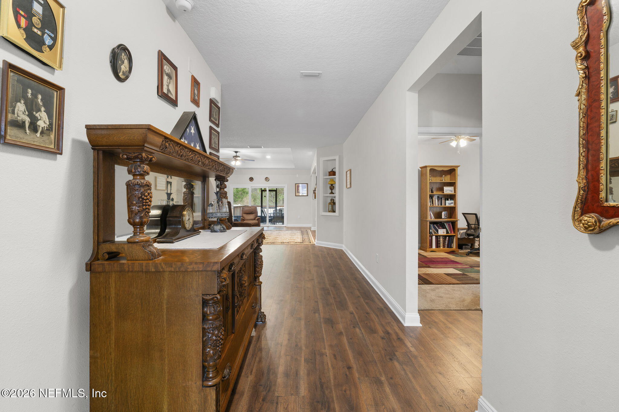 620 Ivory Palm Road Orange Park, FL 32073 - Photo 4 of 53 a view of living room with furniture and wooden floor