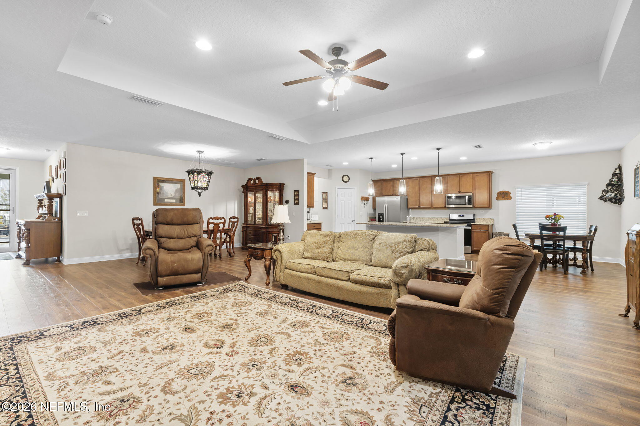 620 Ivory Palm Road Orange Park, FL 32073 - Photo 8 of 53 a living room with furniture and kitchen view