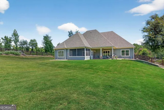 an aerial view of a house having outdoor space