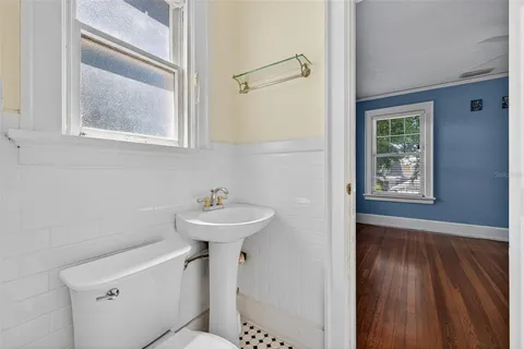 a bathroom with a sink and mirror