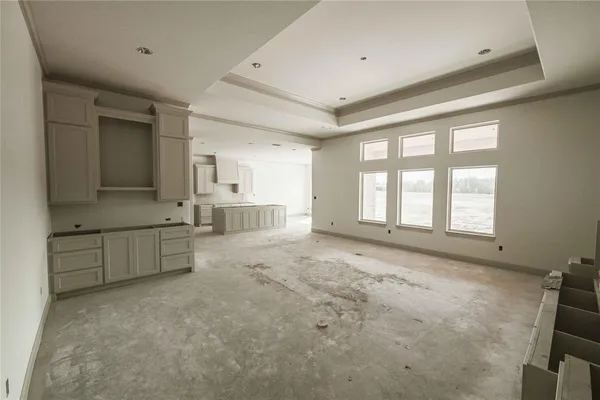 a large bathroom with a granite countertop sink mirror and a bathtub
