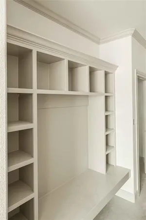 a view of an empty walk in closet