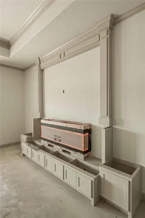 a room with stainless steel appliances a stove and a refrigerator