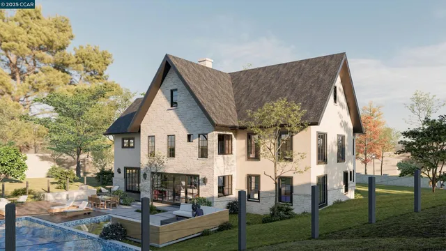 a view of a white house next to a yard with big trees