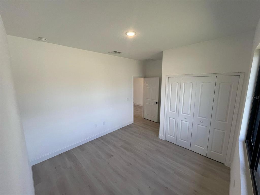 1597 Kerman Street North Port, FL 34288 - Photo 12 of 26 a view of an empty room