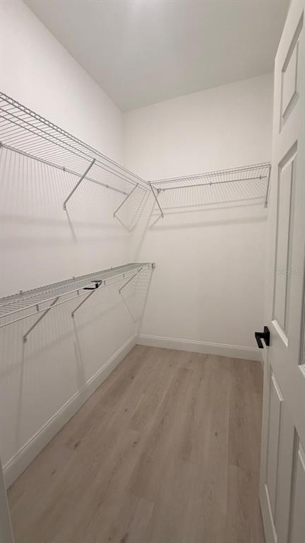 1597 Kerman Street North Port, FL 34288 - Photo 21 of 26 a view of a room with racks on the wall