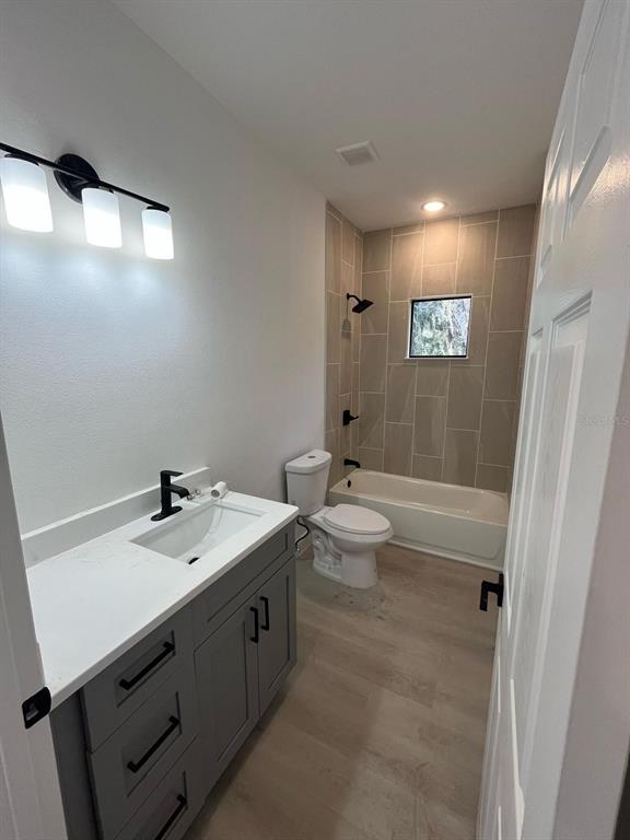 1597 Kerman Street North Port, FL 34288 - Photo 6 of 26 a bathroom with a double vanity sink and a mirror