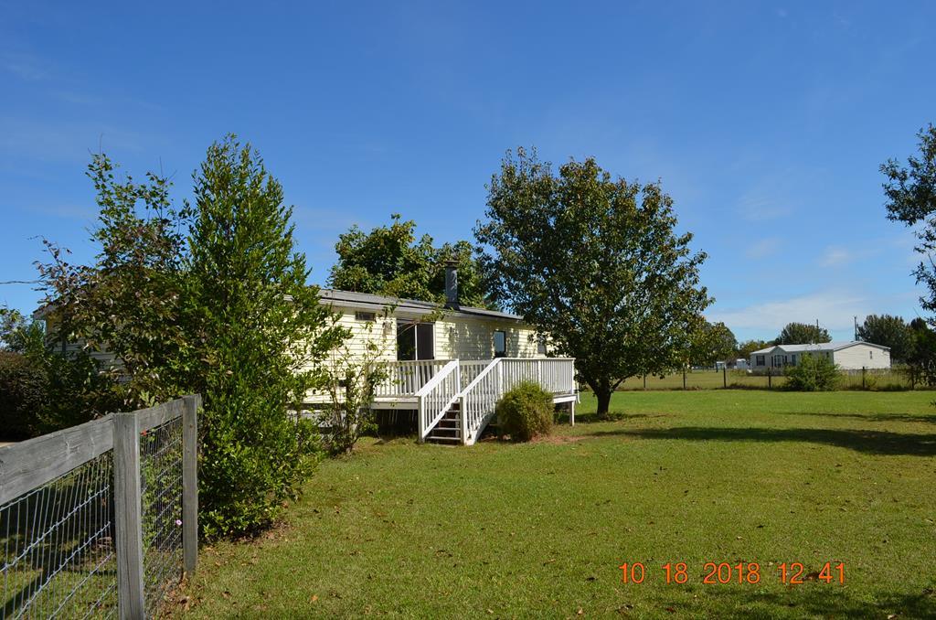 1055 Burnett Road Byron, GA 31008 - Photo 6 of 23 a view of a house with backyard