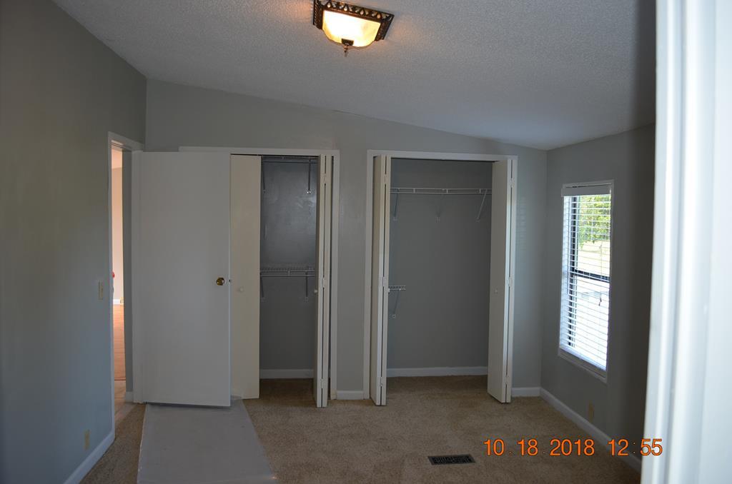 1055 Burnett Road Byron, GA 31008 - Photo 8 of 23 a view of an empty room with a window