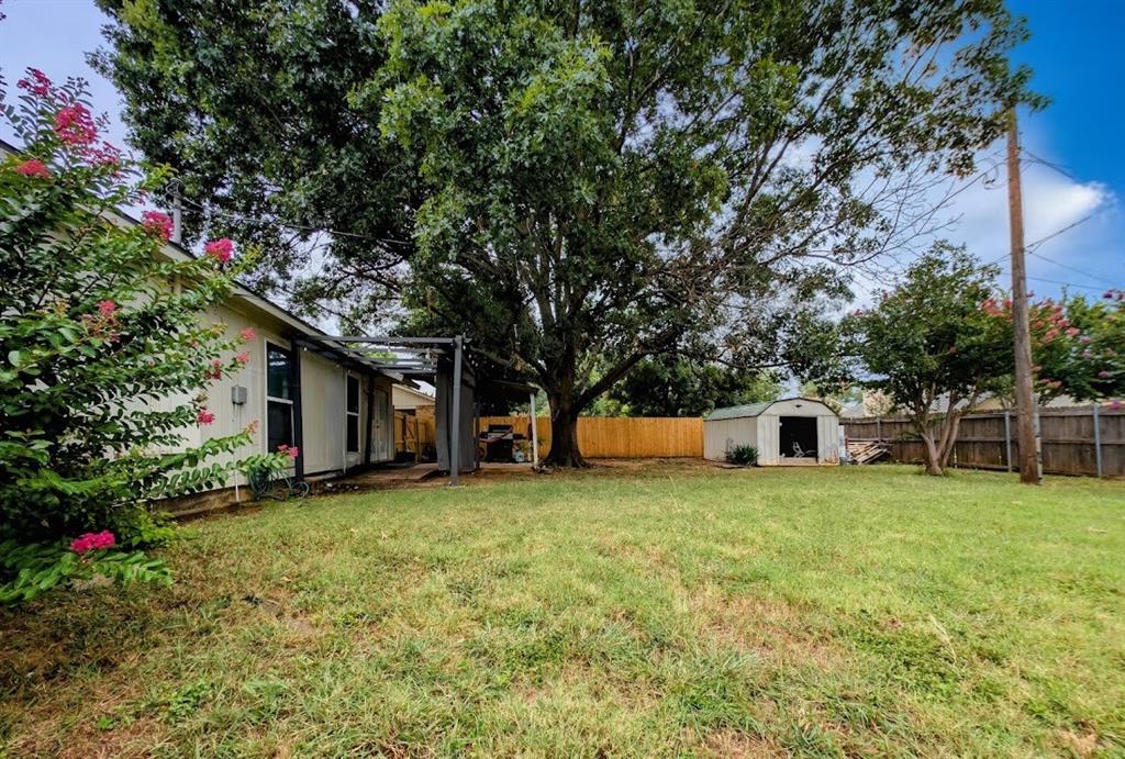 1901 Bosque Lane Arlington, TX 76006 - Photo 13 of 13 a view of a house with a yard and tree