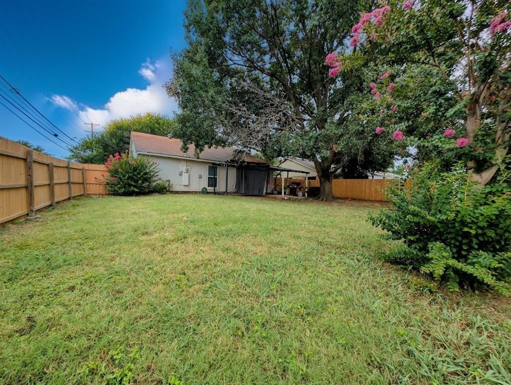 1901 Bosque Lane Arlington, TX 76006 - Photo 3 of 13 a view of a house with a yard and sitting area