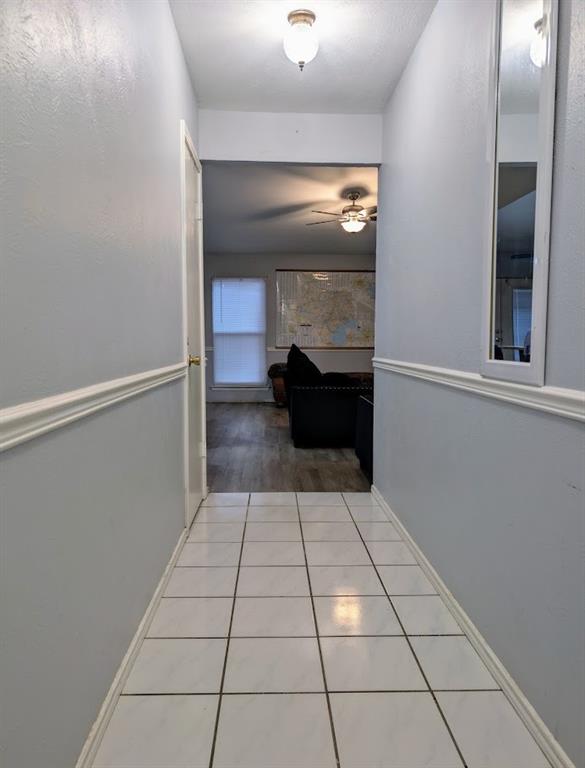 1901 Bosque Lane Arlington, TX 76006 - Photo 4 of 13 a view of empty room with wooden floor