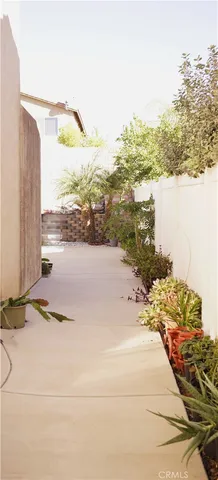 a picture of a floor to ceiling window and an empty room