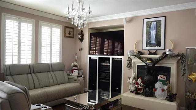 a kitchen with granite countertop a sink a stove and cabinets