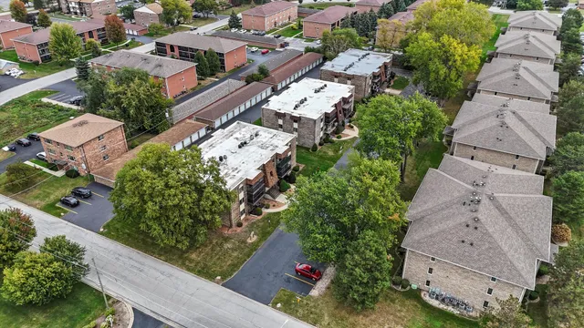 an aerial view of residential house with outdoor space