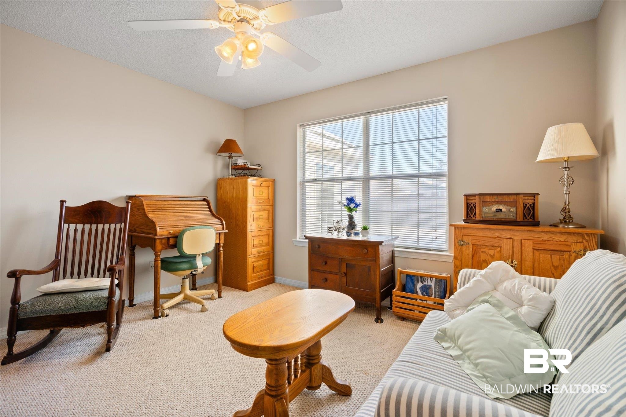 8374 Kipling Court Mobile, AL 36695 - Photo 17 of 20 Living area featuring light carpet and ceiling fan