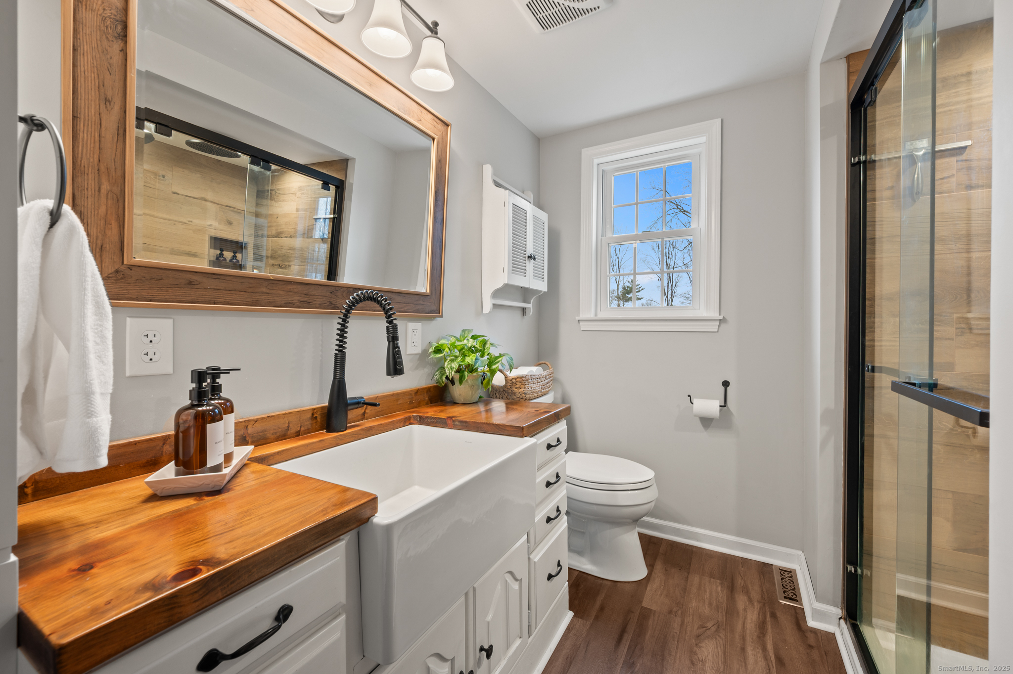 192 Leonard Road Stafford, CT 06076 - Photo 16 of 40 a bathroom with a granite countertop sink vanity mirror and toilet