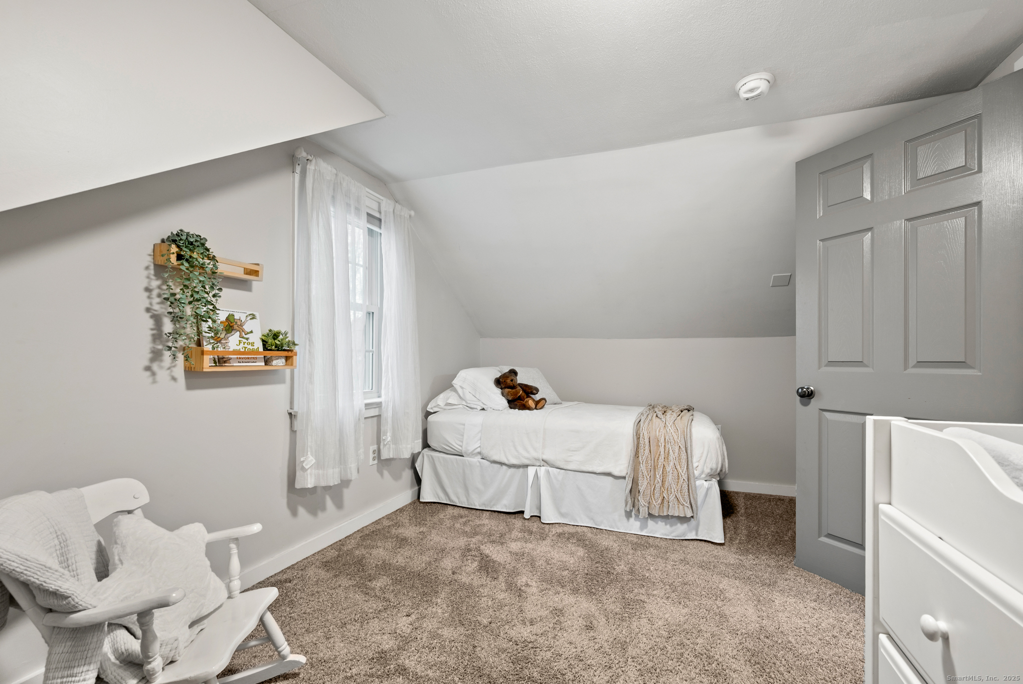 192 Leonard Road Stafford, CT 06076 - Photo 18 of 40 a room with a bed and a window