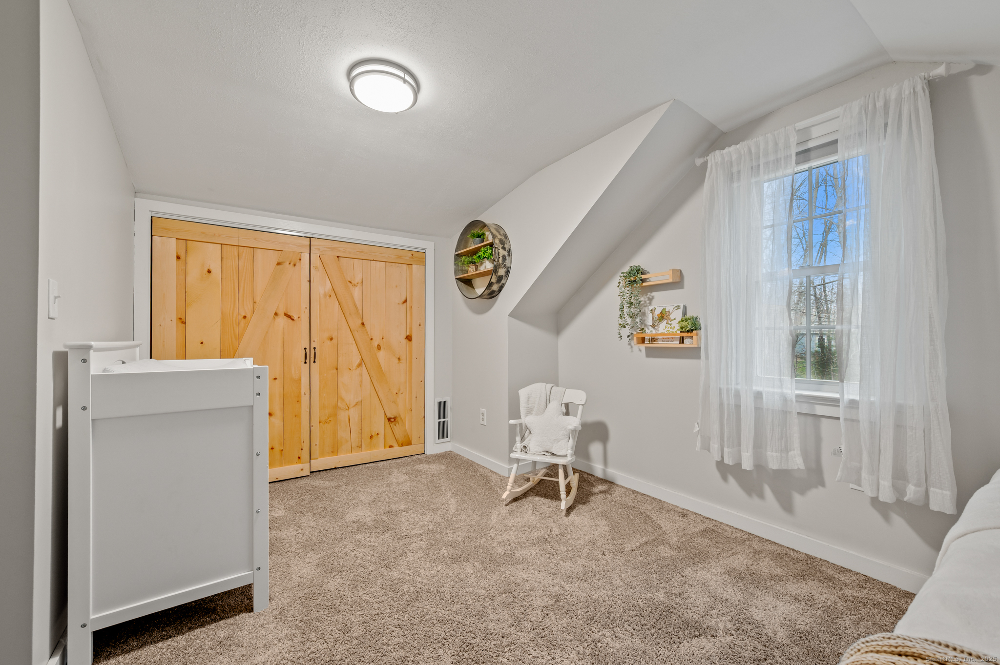 192 Leonard Road Stafford, CT 06076 - Photo 19 of 40 a view of an empty room with a window