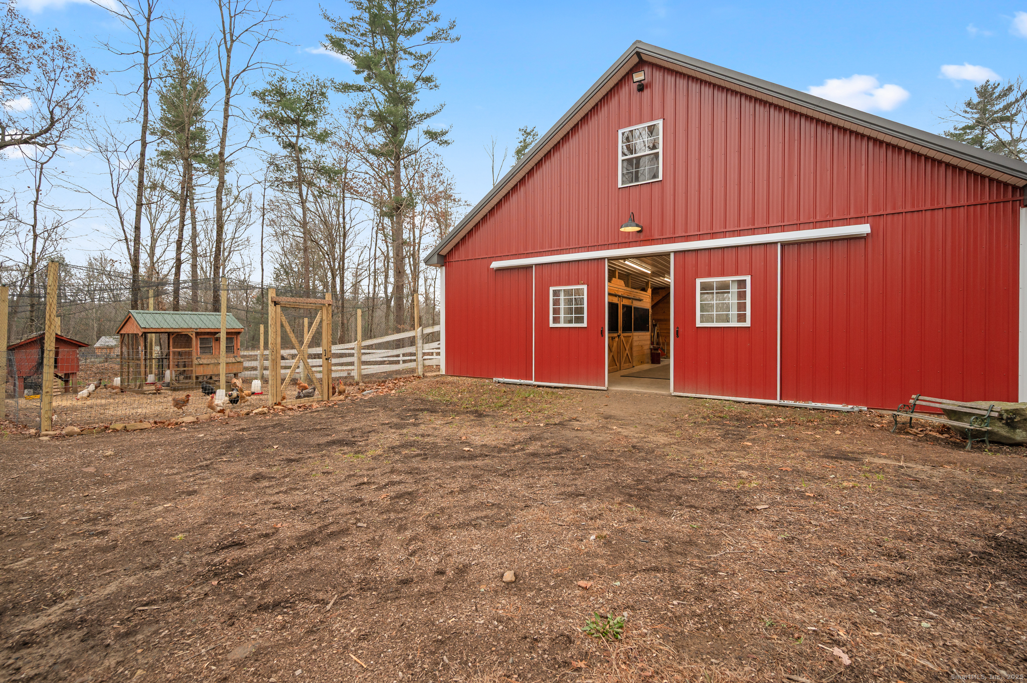 192 Leonard Road Stafford, CT 06076 - Photo 28 of 40 a front view of a house with a yard