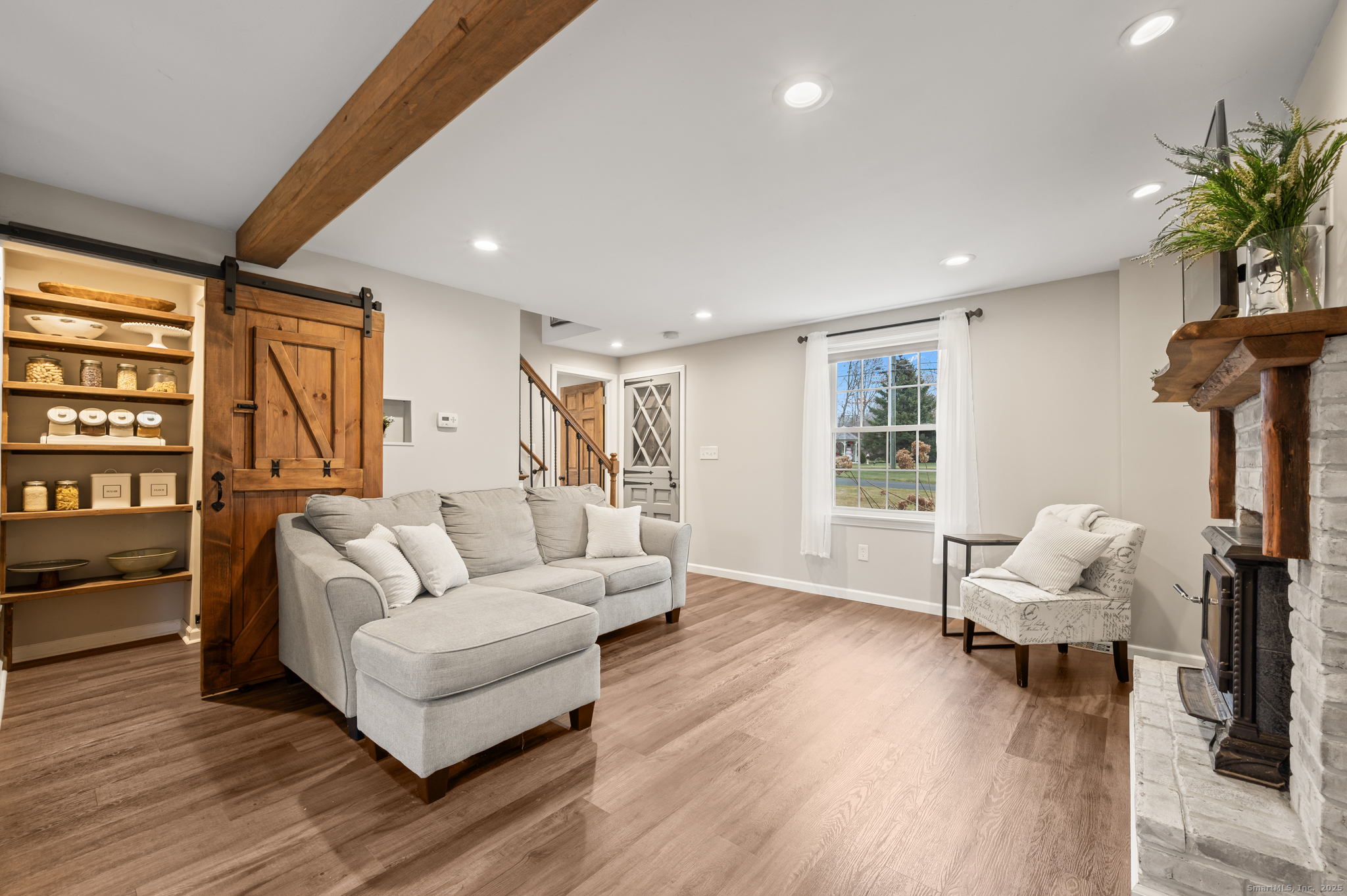 192 Leonard Road Stafford, CT 06076 - Photo 10 of 40 a living room with furniture and a large window
