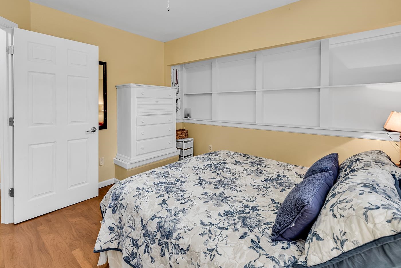 724 Juniper Drive, Unit B Surfside Beach, SC 29575 - Photo 19 of 36 Bedroom featuring light wood-type flooring and baseboards
