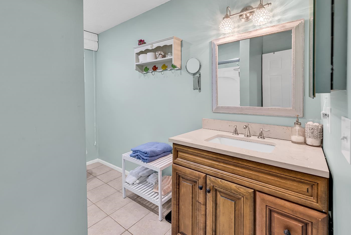 724 Juniper Drive, Unit B Surfside Beach, SC 29575 - Photo 20 of 36 Bathroom featuring vanity and light tile patterned floors