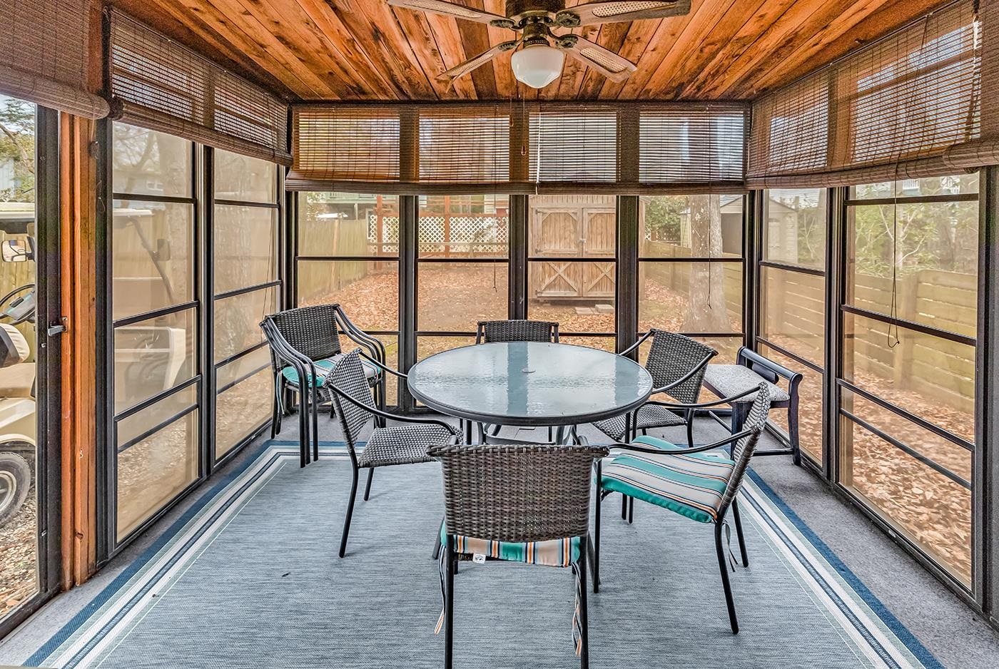724 Juniper Drive, Unit B Surfside Beach, SC 29575 - Photo 25 of 36 Sunroom with outdoor dining area and a ceiling fan