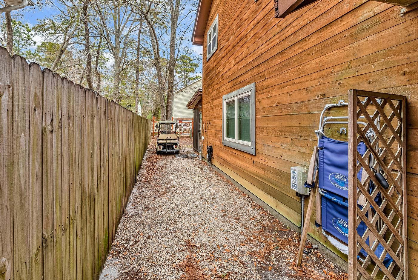 724 Juniper Drive, Unit B Surfside Beach, SC 29575 - Photo 30 of 36 View of side of home