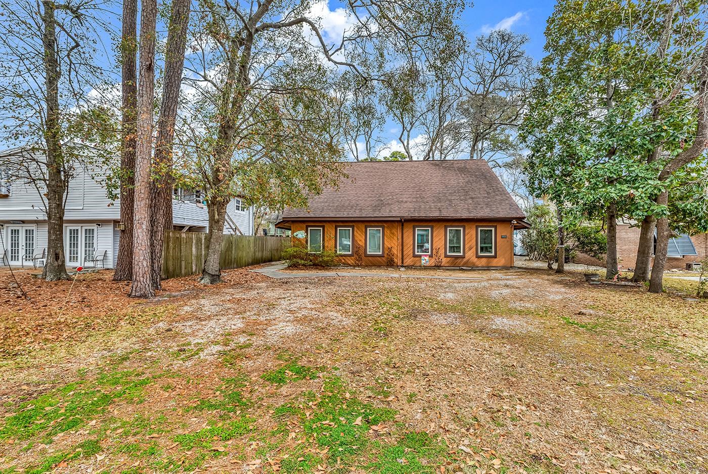 724 Juniper Drive, Unit B Surfside Beach, SC 29575 - Photo 3 of 36 View of front facade featuring roof with shingles