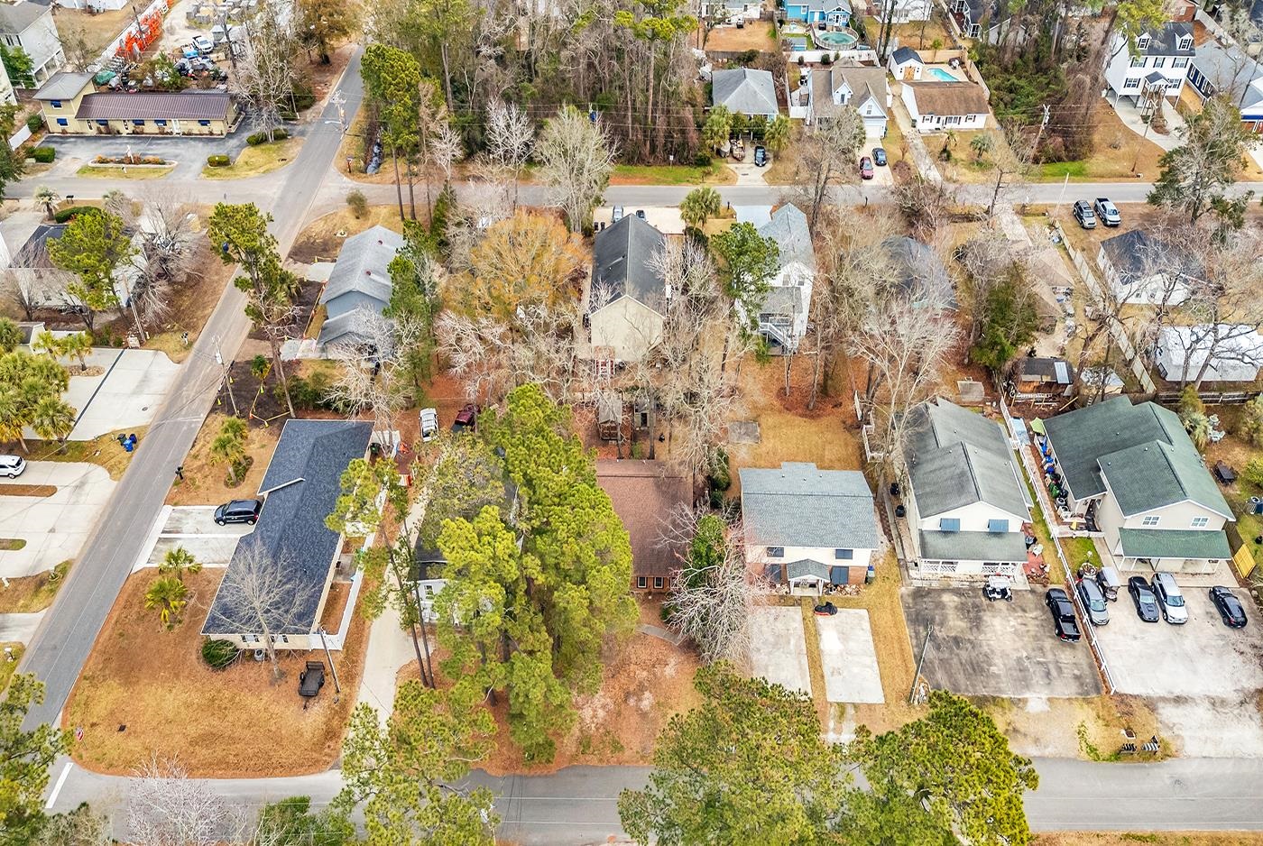 724 Juniper Drive, Unit B Surfside Beach, SC 29575 - Photo 31 of 36 Aerial view of property's location with nearby suburban area