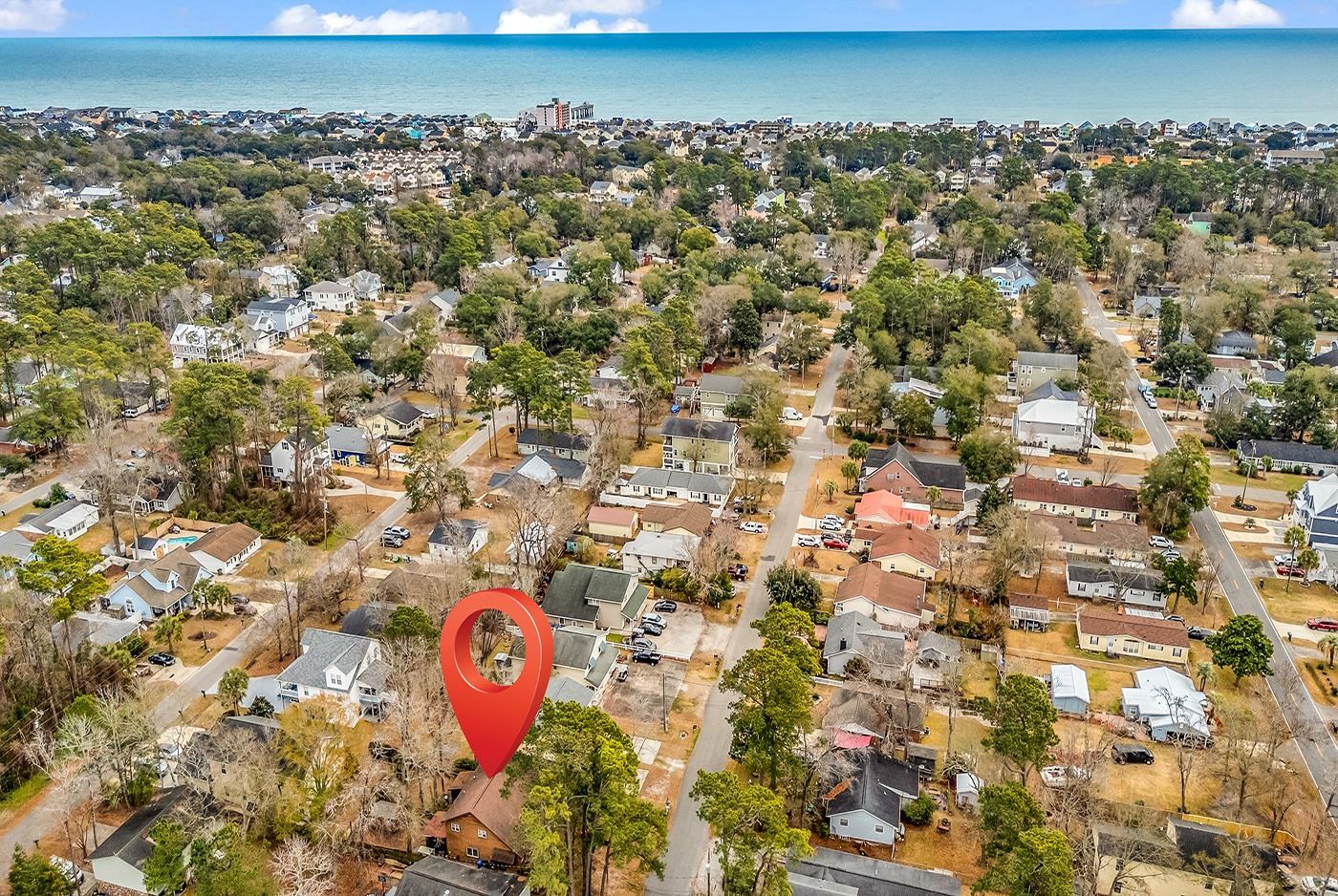 724 Juniper Drive, Unit B Surfside Beach, SC 29575 - Photo 33 of 36 Aerial overview of property's location featuring nearby suburban area